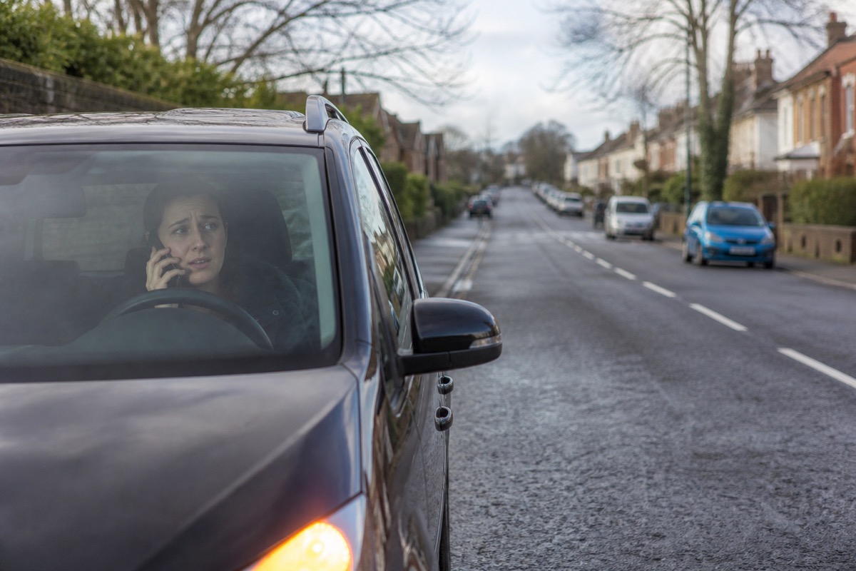 Motorist calling roadside assistance when a car will not start